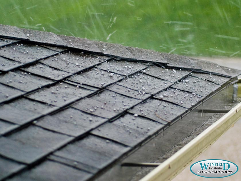 290-1616656177-asphalt-shingle-roofing-hail-storm-1
